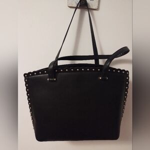 Large sized, generic brand purse